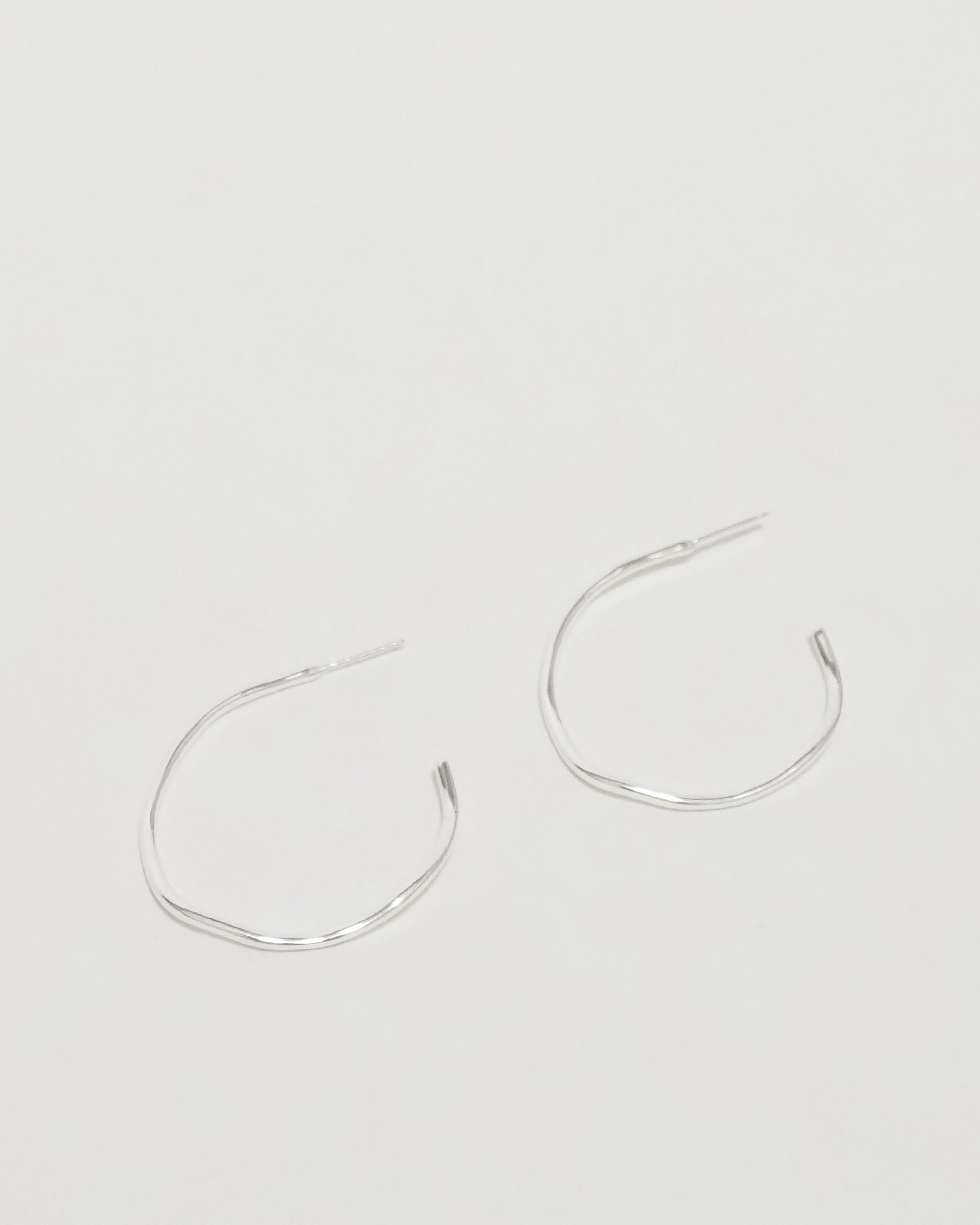 Ethereal Liquid Silhouette Hoops