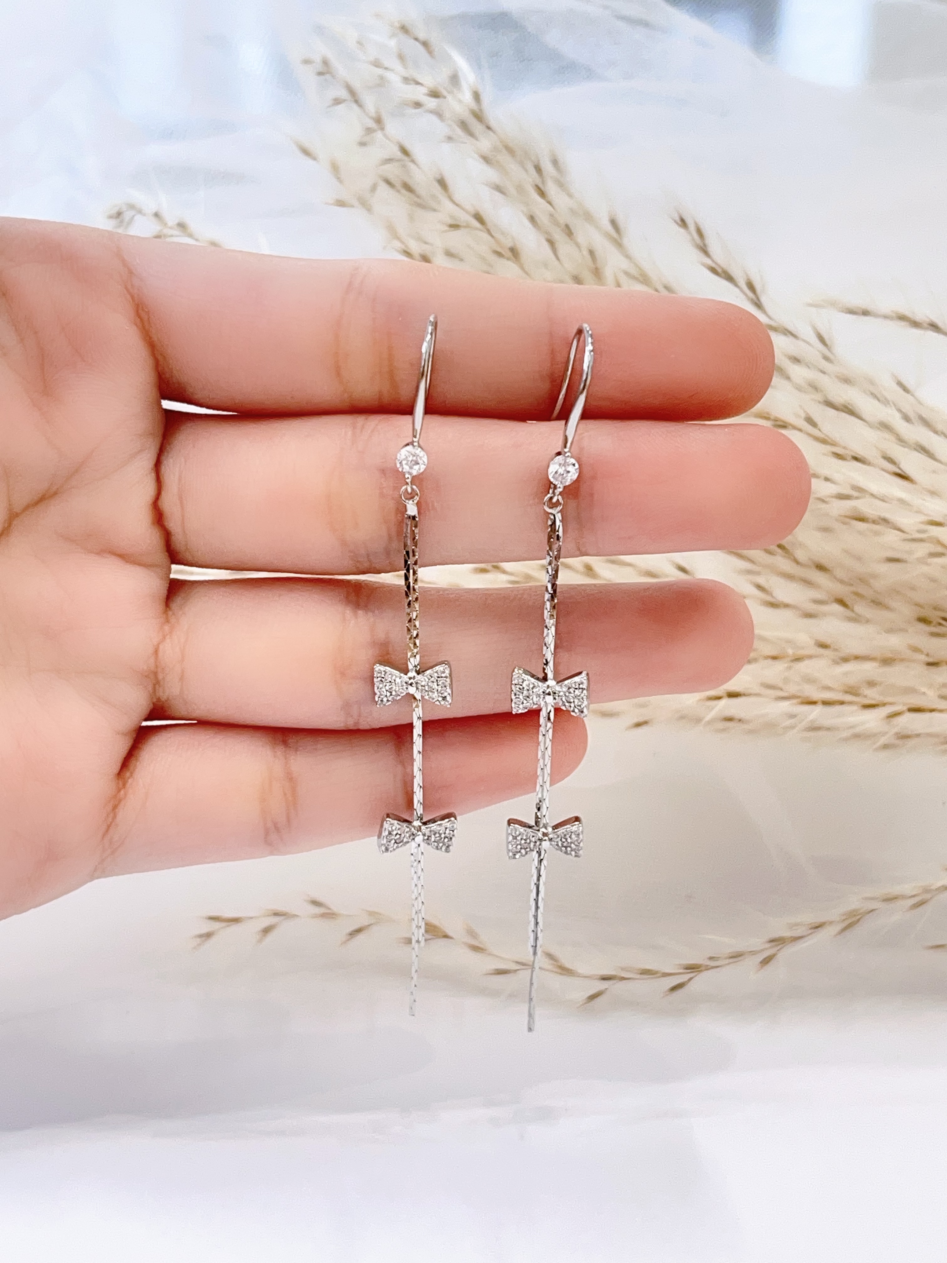 温柔风镶钻蝴蝶结流苏耳环