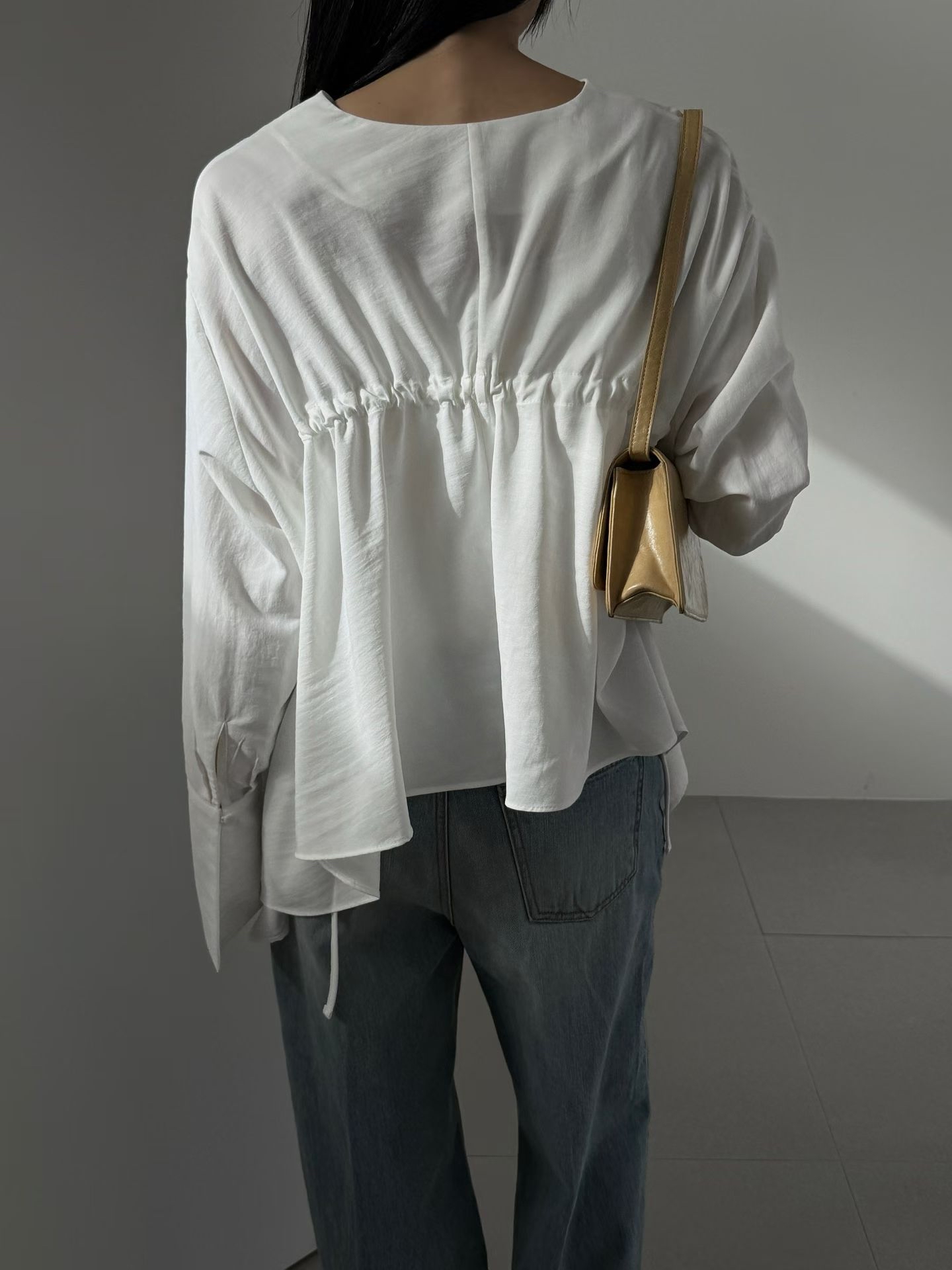 Shirred back flare unbalance blouse
