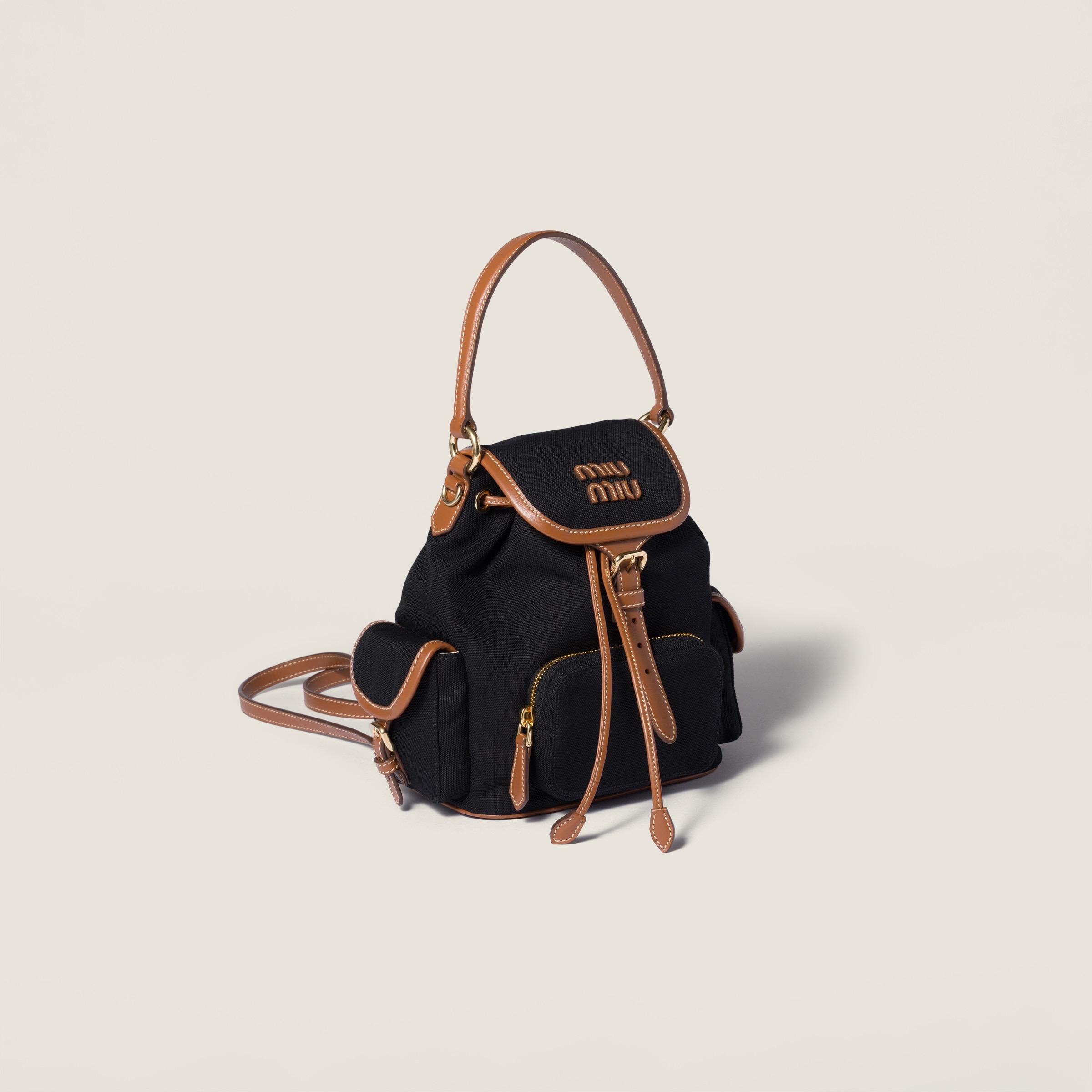 Miu Miu 女士 翻蓋雙肩包均碼碼18cm*11.5cm*22cm