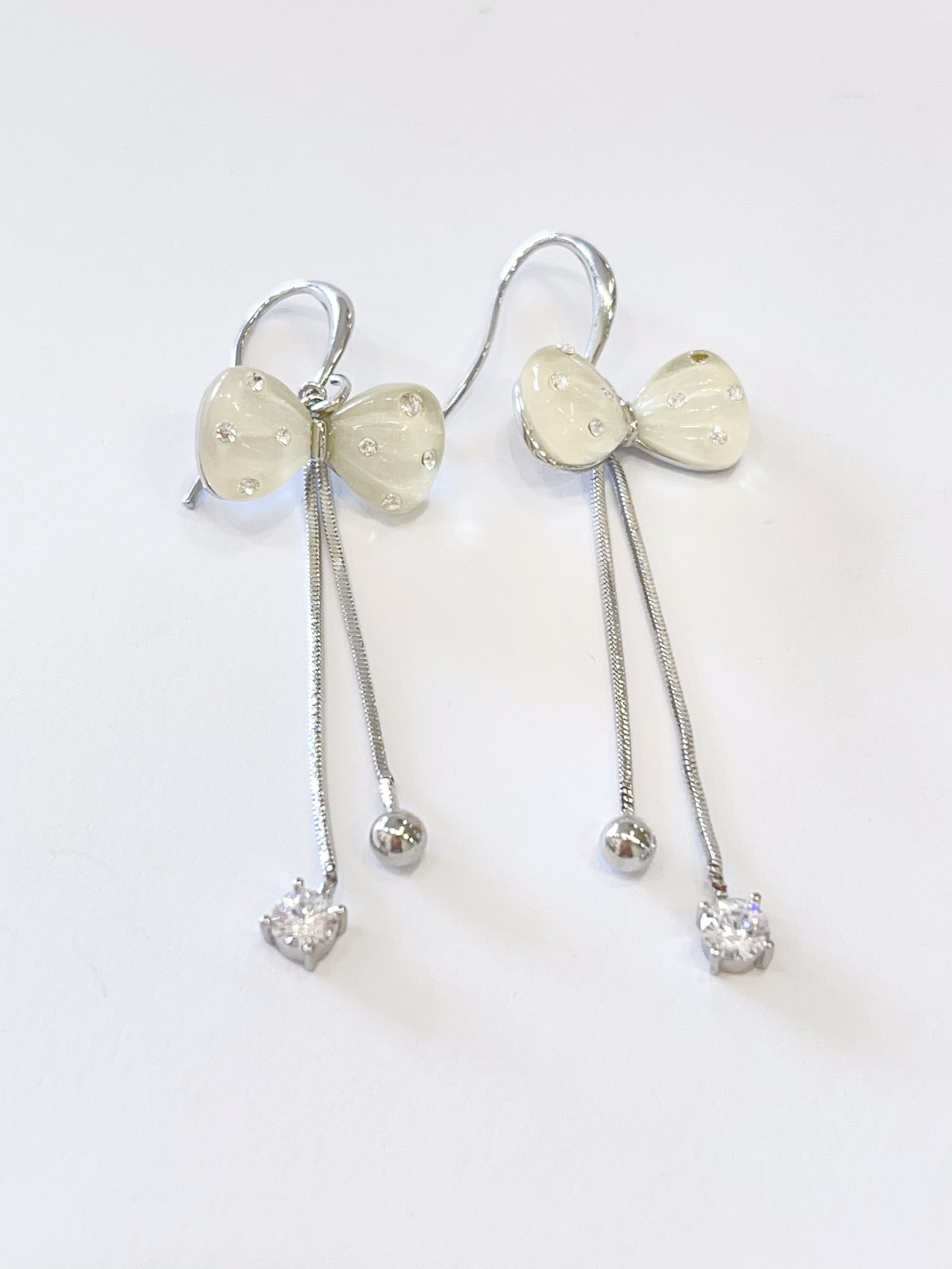 透明立体蝴蝶结双流苏耳环