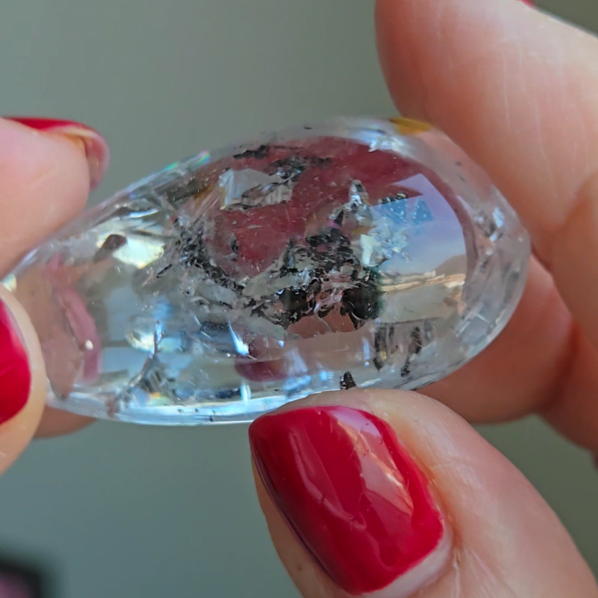 Enhydro cabochon with big bubble and carbon - EN4