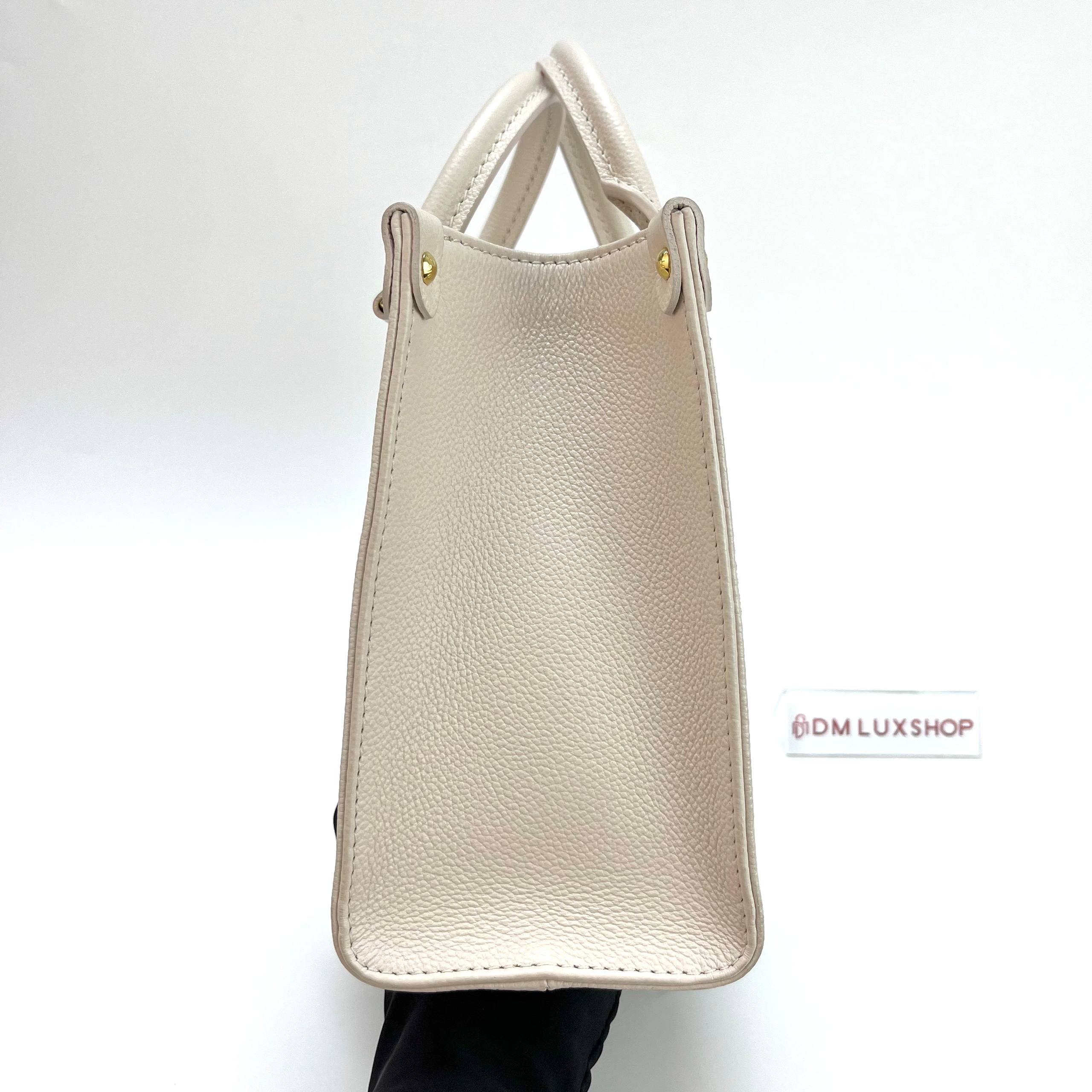LV OnTheGo Beige Monogram Empreinte PM GHW