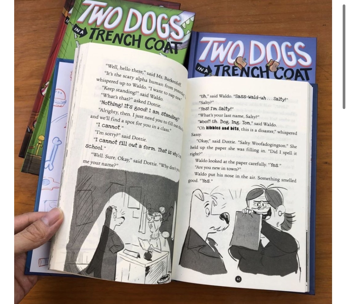 1. TWO DOGS IN A TRENCH COAT GO TO SCHOOL 2. TWO DOGS IN A TRENCH COAT START A CLUB BY ACCIDENT 3. TWO DOGS IN A TRENCH COAT AND THE LITTLE CAR WITH THE BIG PROBLEM（這本在第三層） 4. TWO DOGS IN A TRENCH COAT ENTER STAGE LEFT