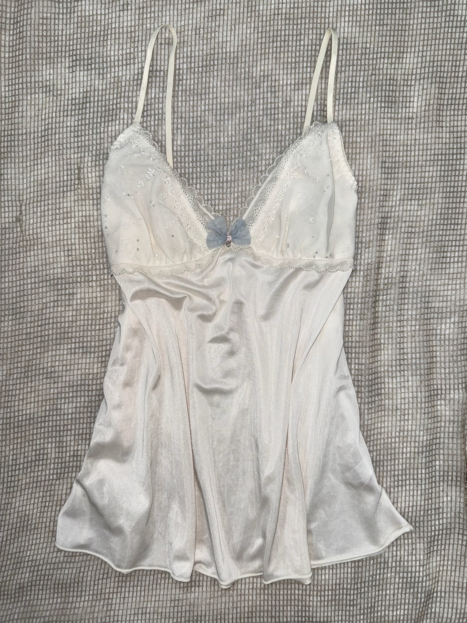White Satin Camisole Top with Lace Embroidery and Blue Bow Detail