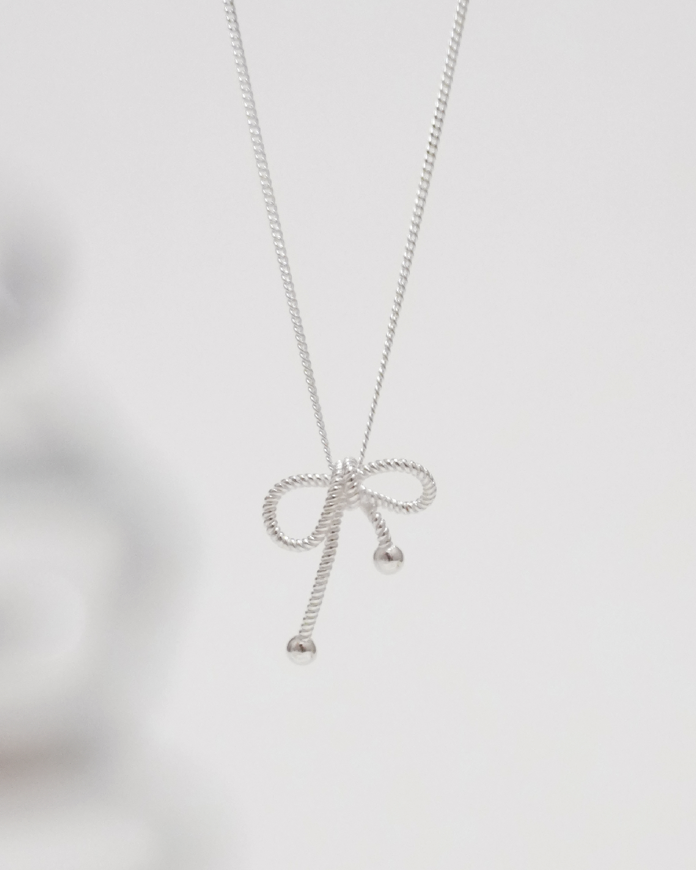 Intertwined Ribbon Necklace