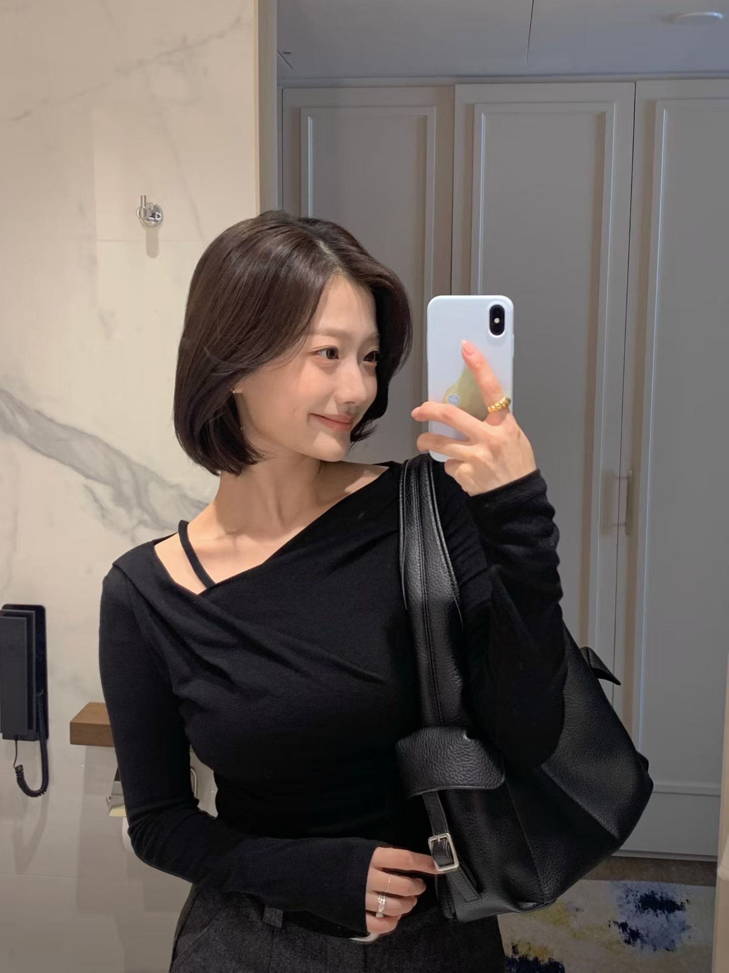 【韓感滿滿】扭結不規則肩帶上衣