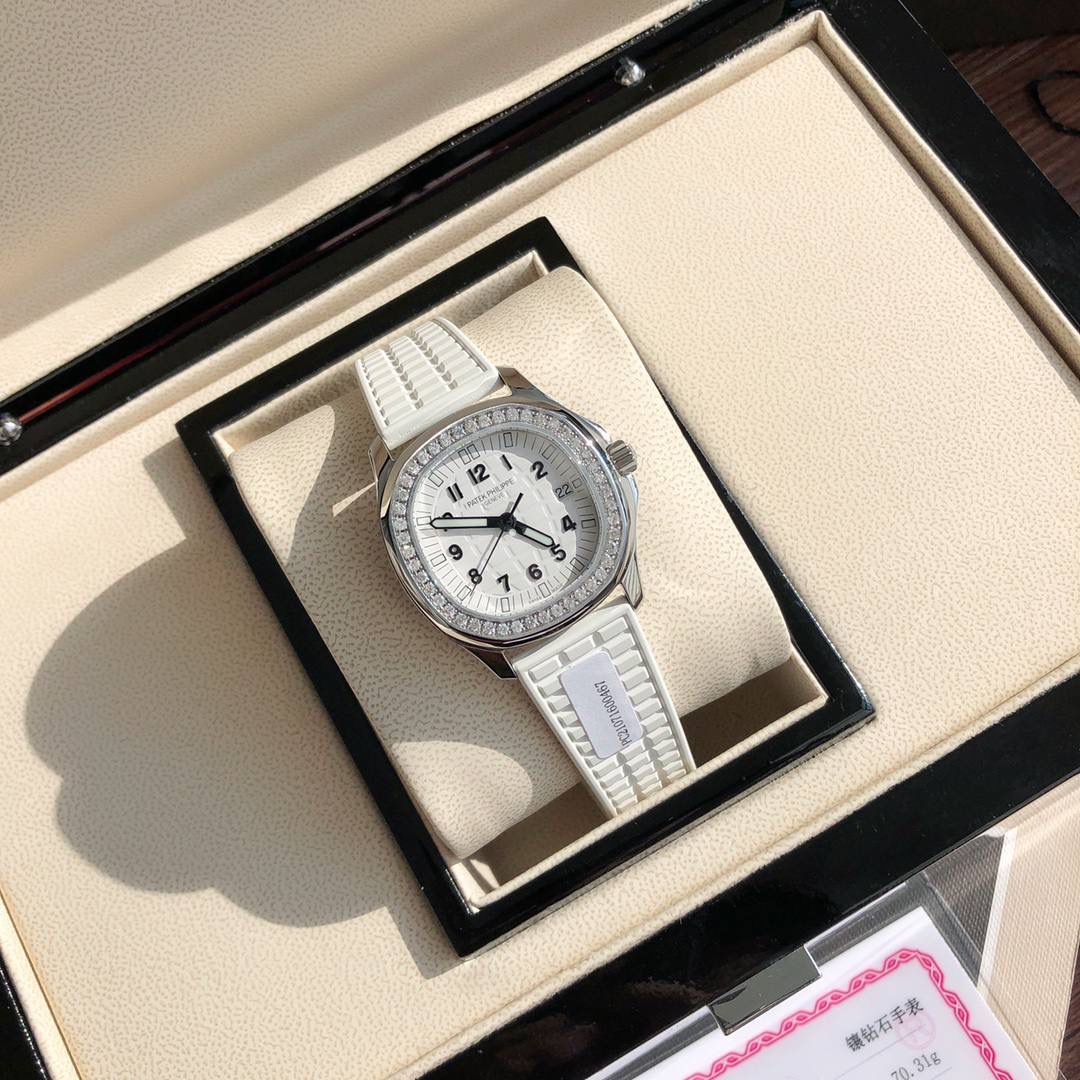 独家推出 新款百达斐丽AQUANAUT系列 专为女性设计！用最简约方式完美体现百达斐丽的精髓，融合了大胆的设计和正统的纯粹，这款腕表成为百达斐丽的旗舰产品之一！腕表完美尺寸35.6，进口精钢材质多重工艺精磨打造。原装一致厚度7.77cm。表盘镶嵌46颗 vs1.8真钻。约一克拉！ Gtc中国权威鉴定证书。百分百保证每一粒都是货真价实的真钻。可验可查询！💯💯