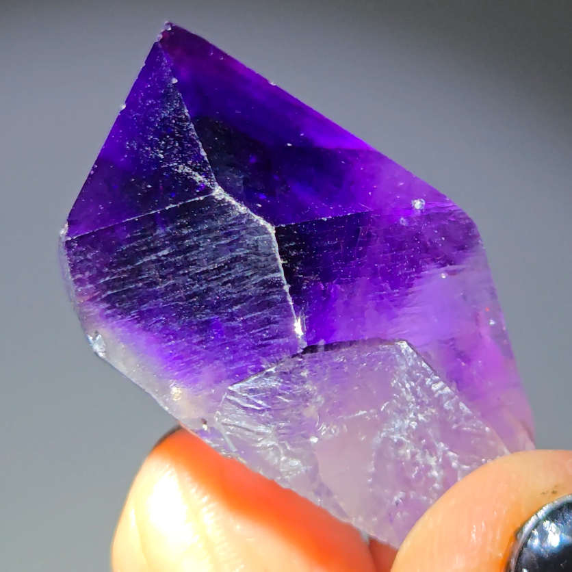 Blue amethyst point with phantom pyramid inclusions - AM143