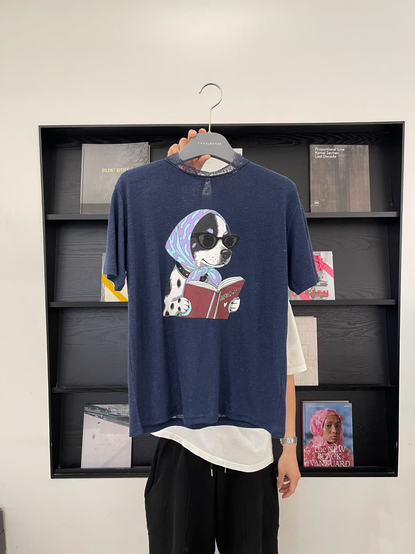 A dog reading book printed tee