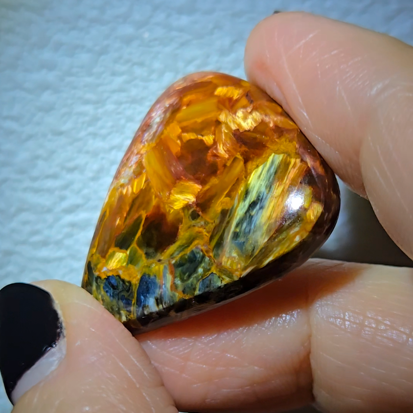 Red, gold, and blue pietersite cabochon - PT10
