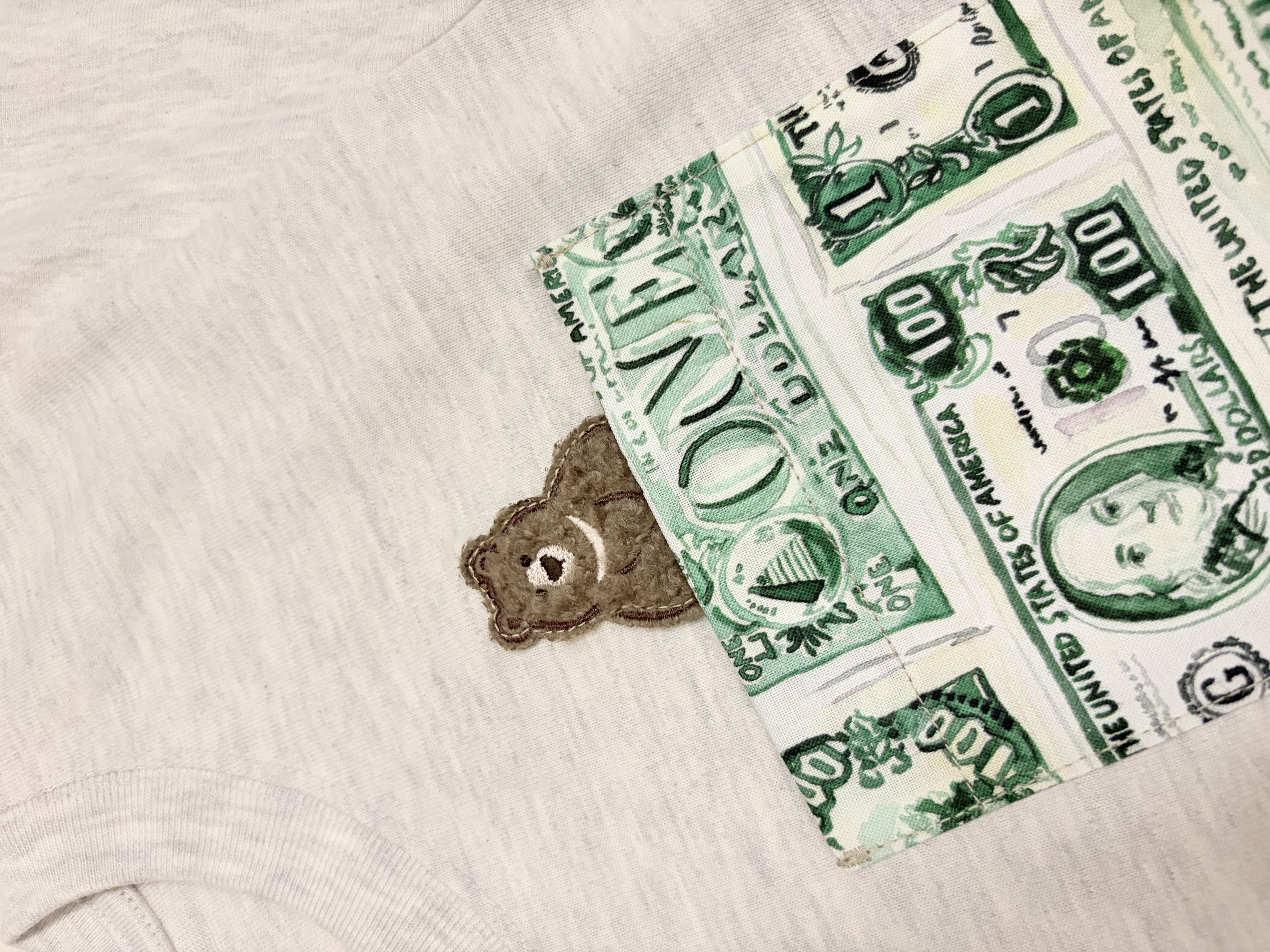 美元與小熊口袋T-Shirt（130碼）