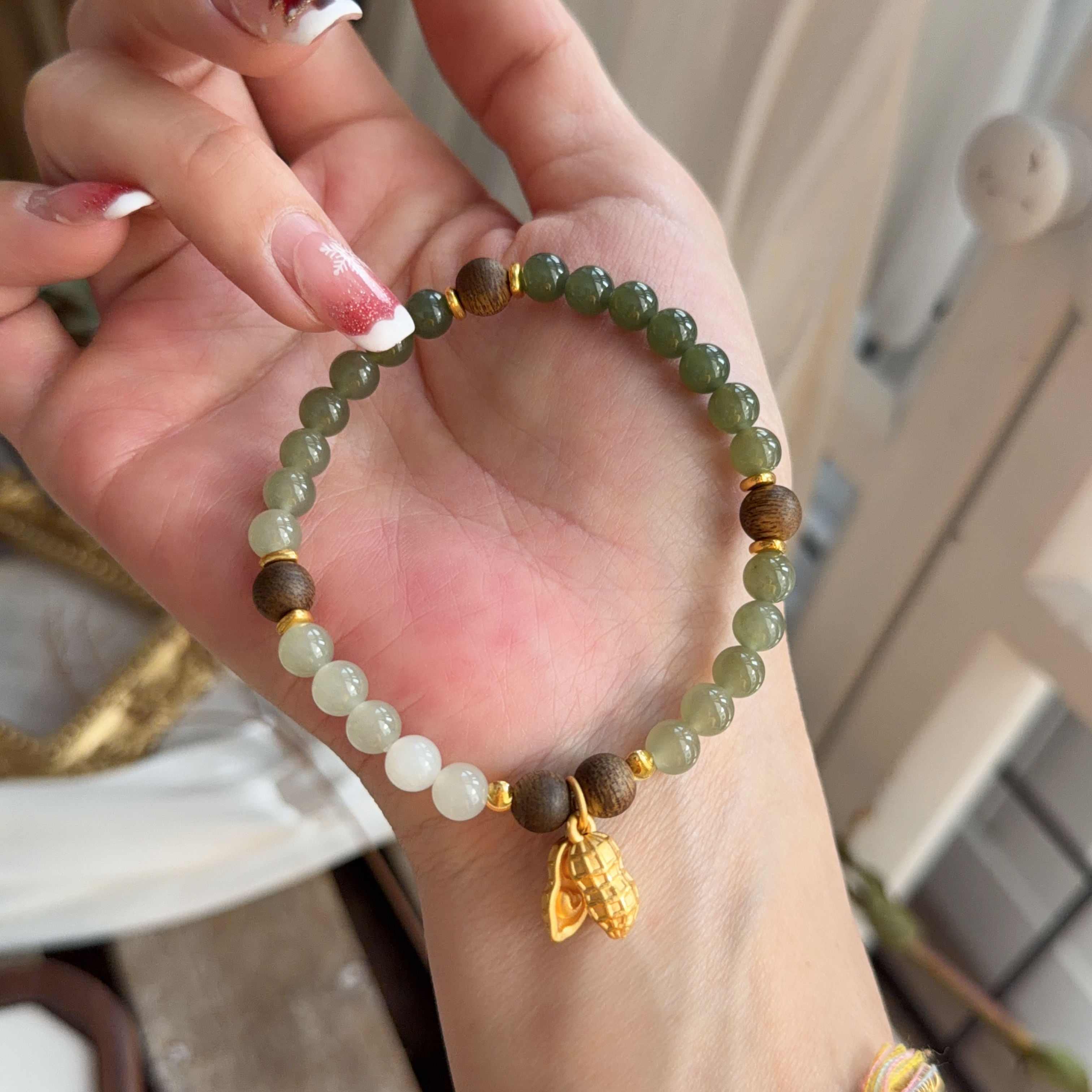 6mm和田玉+沉香襯999足金花生手串