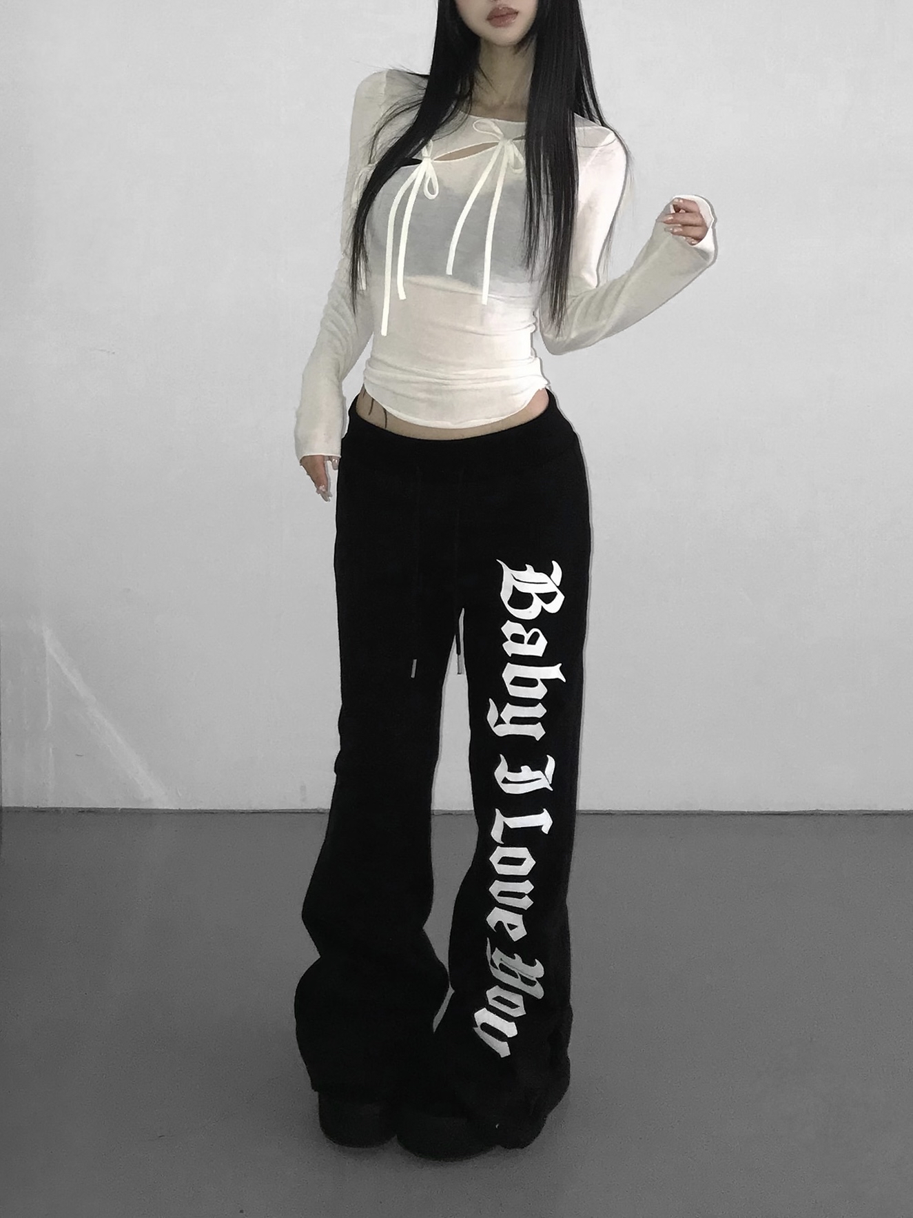 Sheer Tie-Front Cross Graphic Top