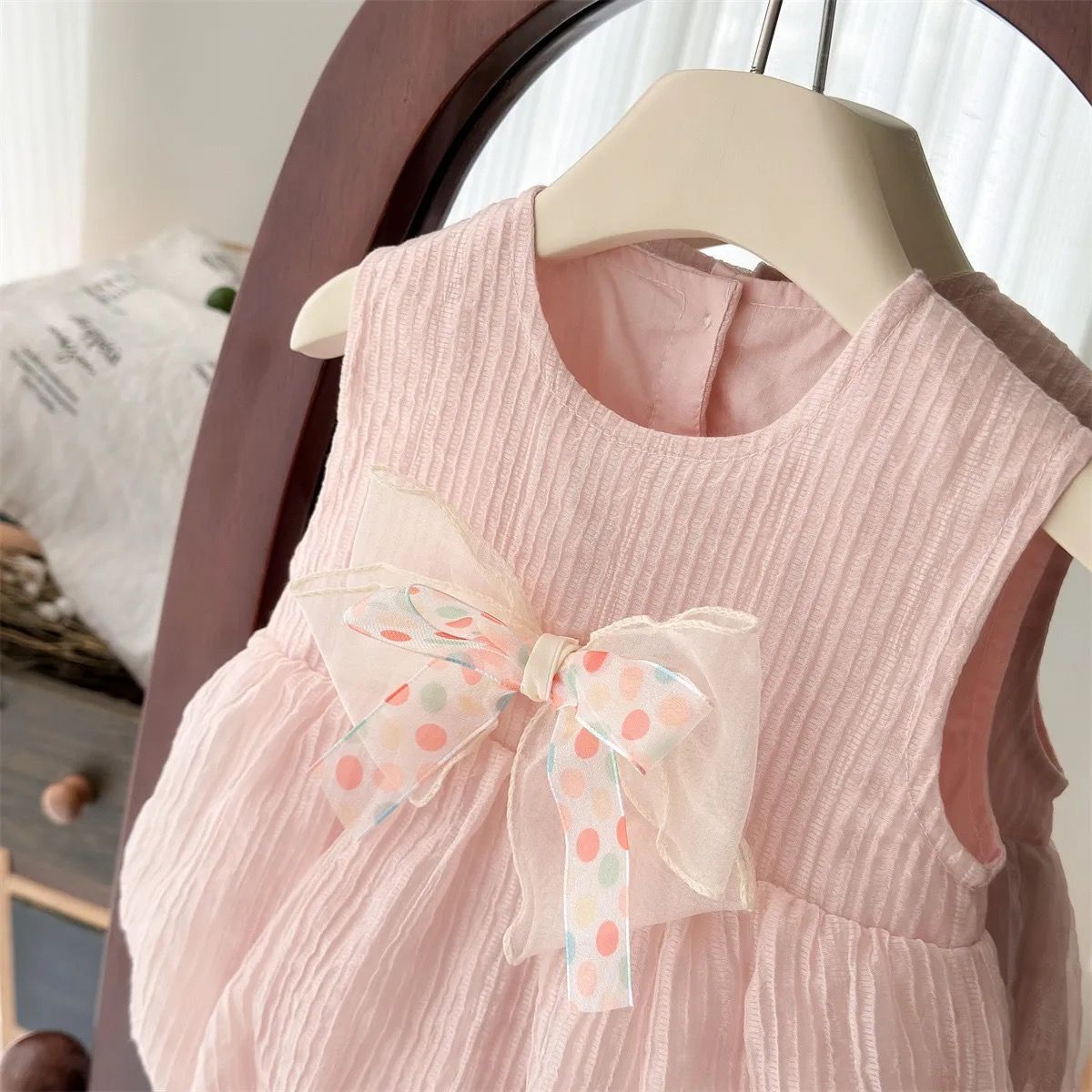 561316 | Charming Baby Girl Sleeveless Bubble Romper with Bow Accent