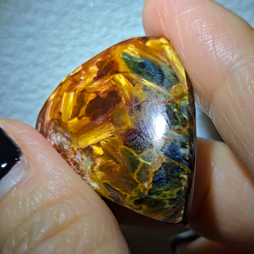 Red, gold, and blue pietersite cabochon - PT10
