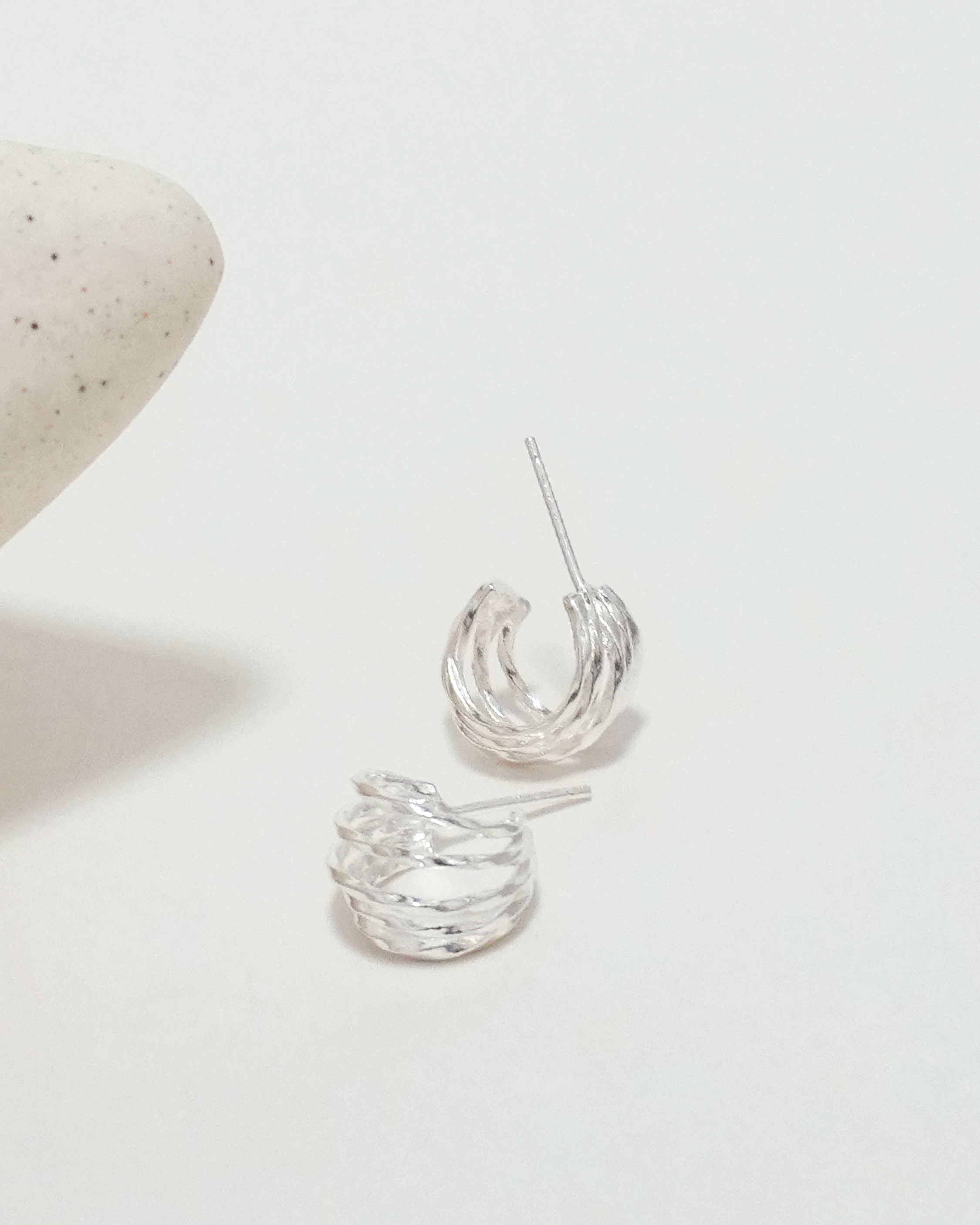 Rhythmic Lunar Twist Hoops