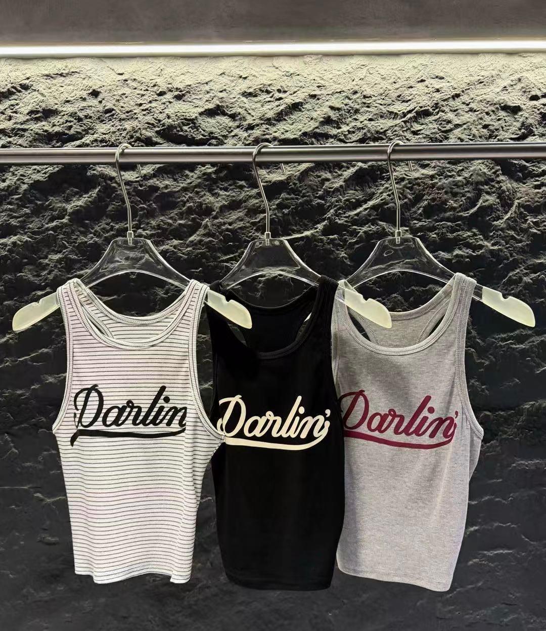 E12 入英文字背心