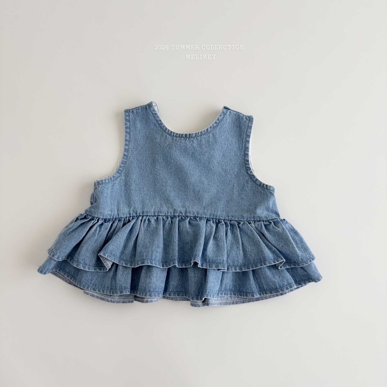 Ribbon Tiered Sleeveless Blouse