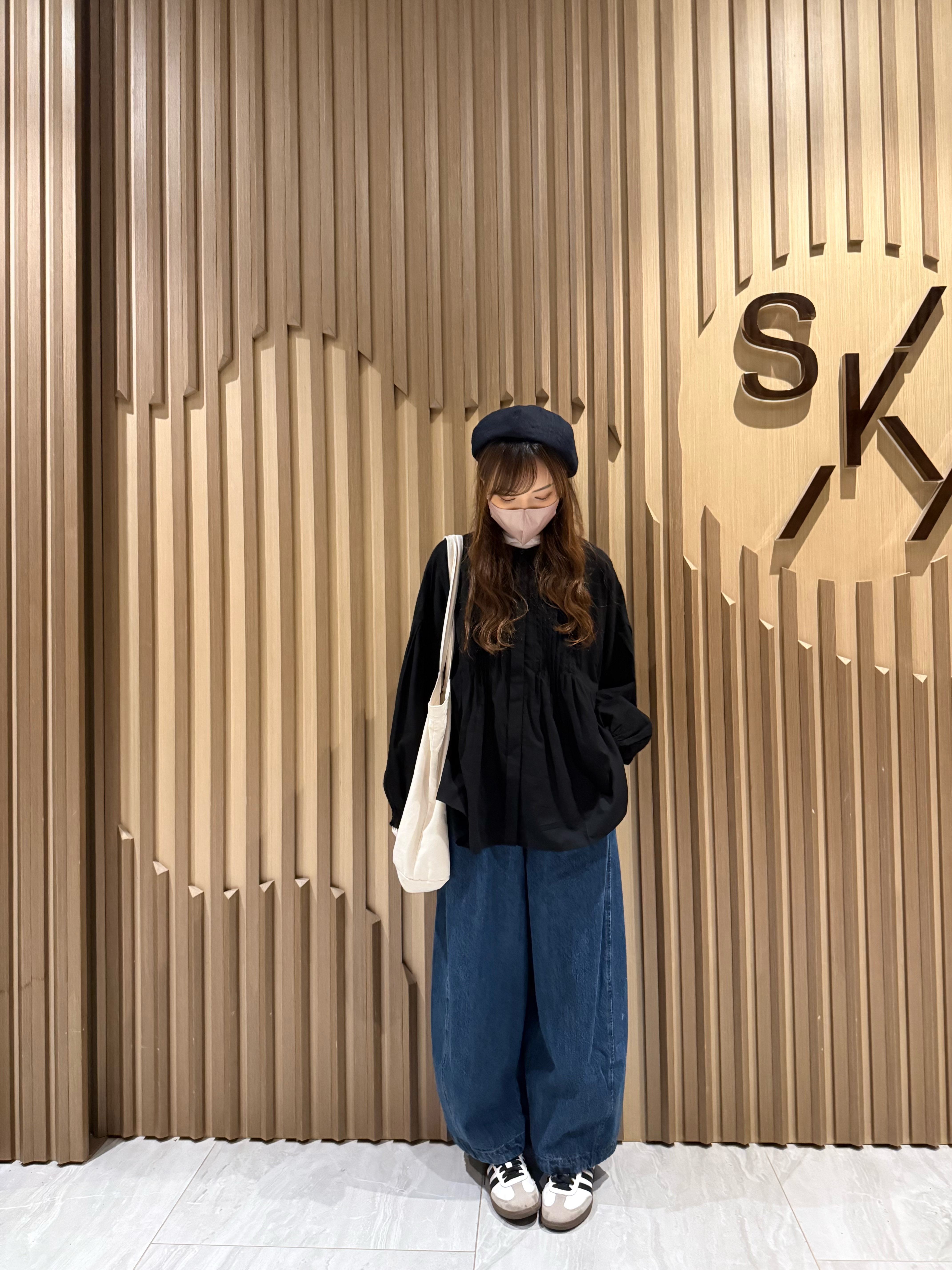 洗水彎刀牛仔褲