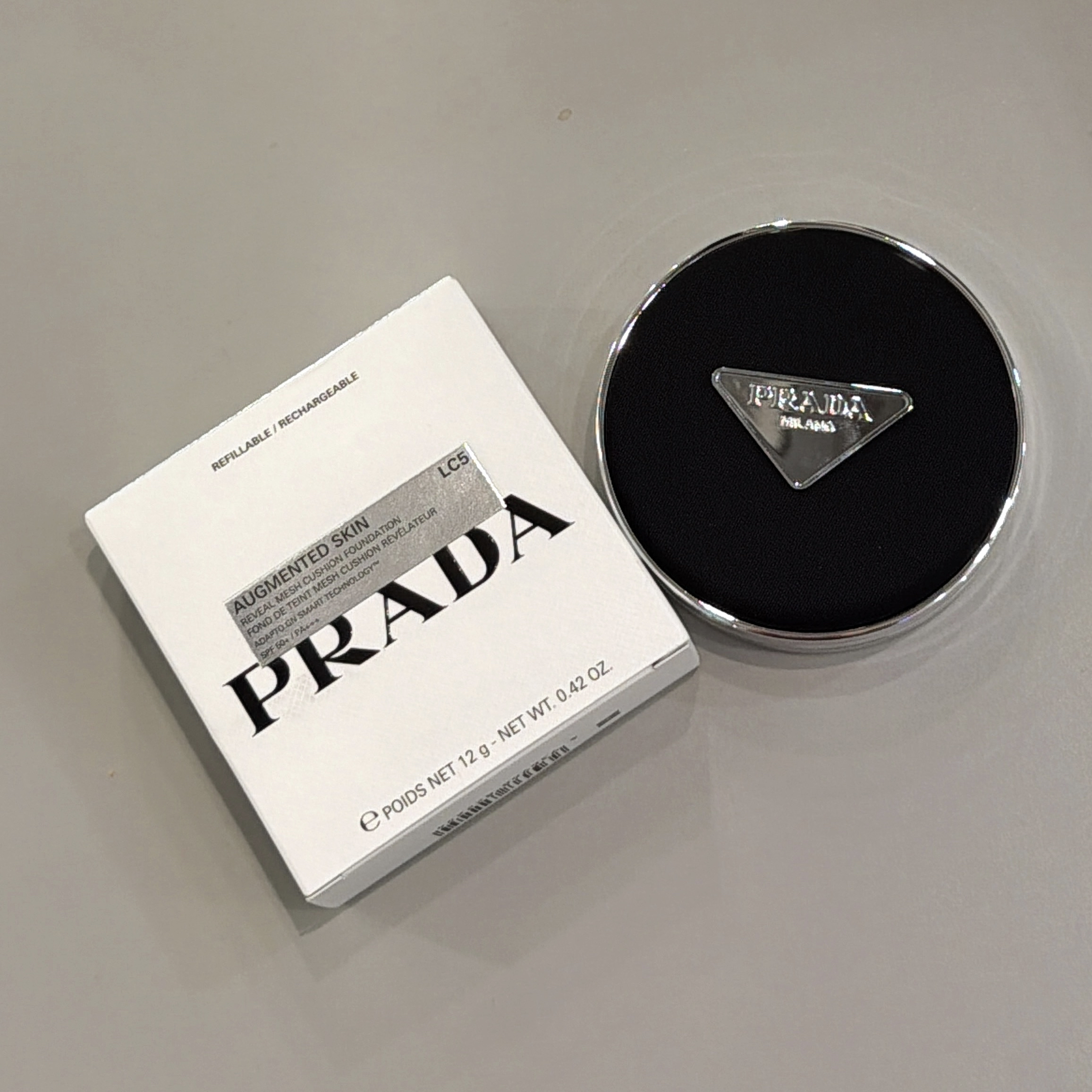 PRADA  BEAUTY REVEAL MESH CUSHION FOUNDATION 原光新肌氣墊粉底SPF+ PA+++  #LC5 (白皙色）12G