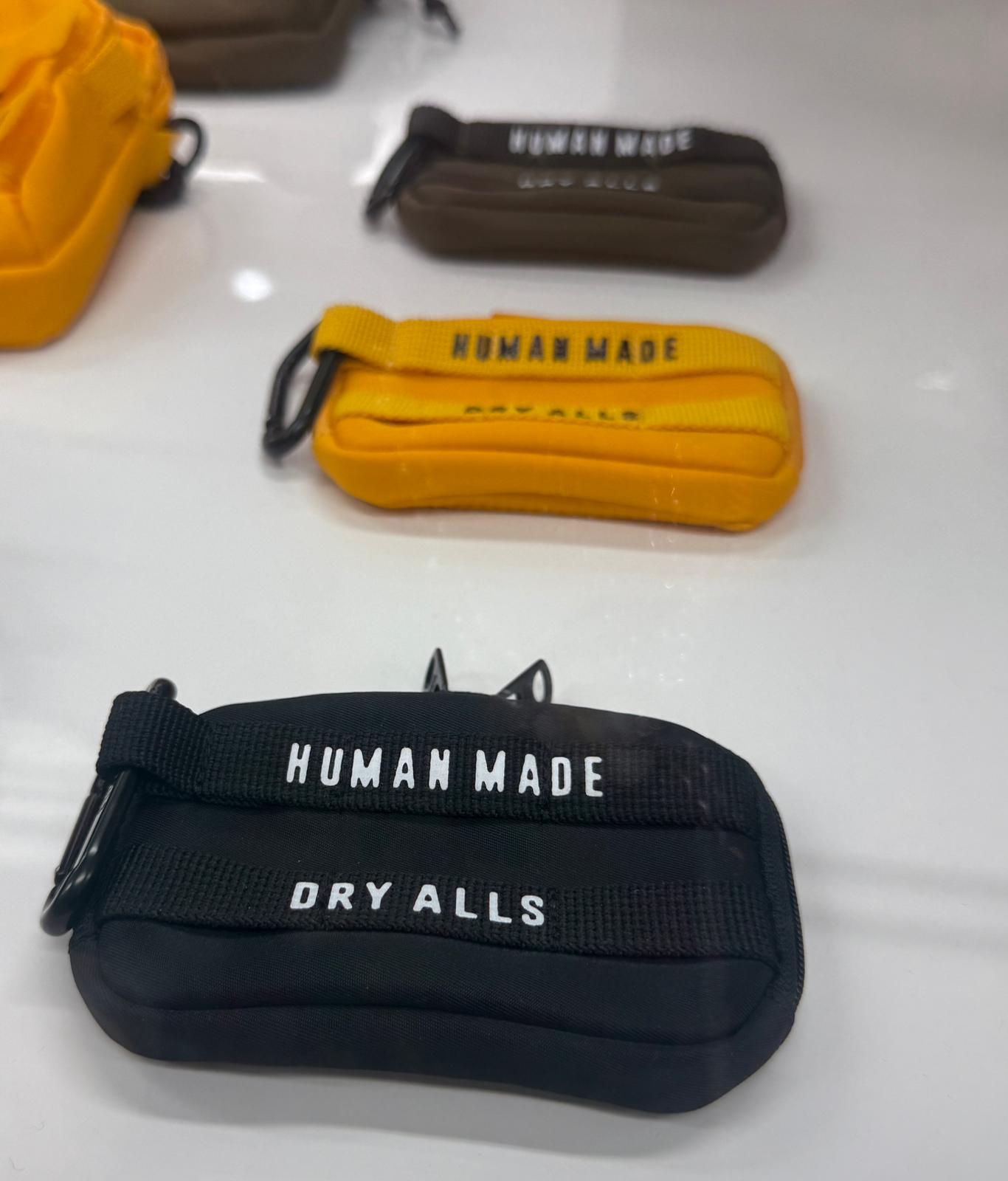 Human made card pouch Yellow / brown / black