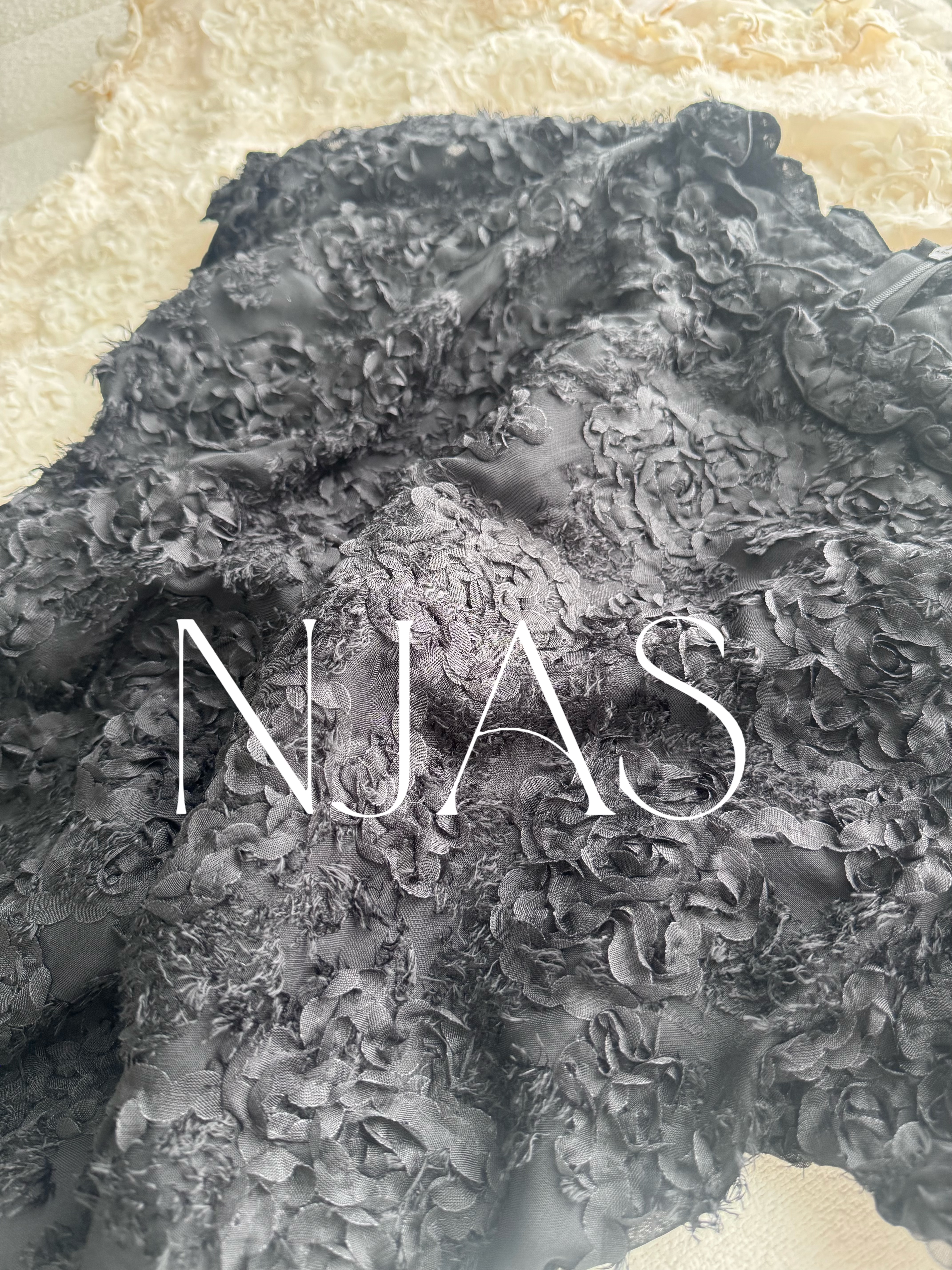 Feminine textured flower blouse