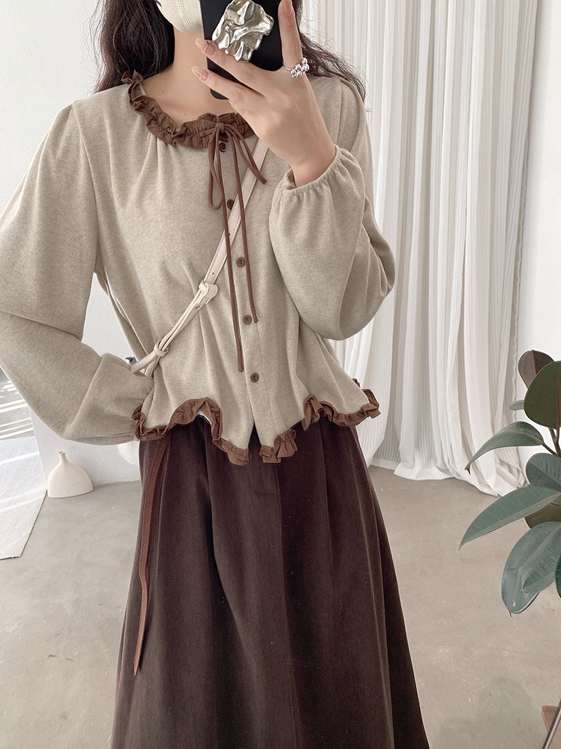 温柔风木耳边不规则波浪蝴蝶结上衣