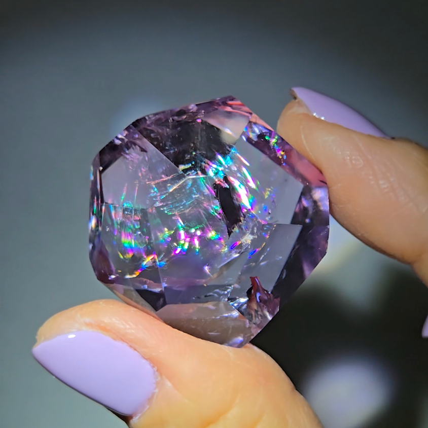 Amethyst pocket stone with stunning rainbows - AME61