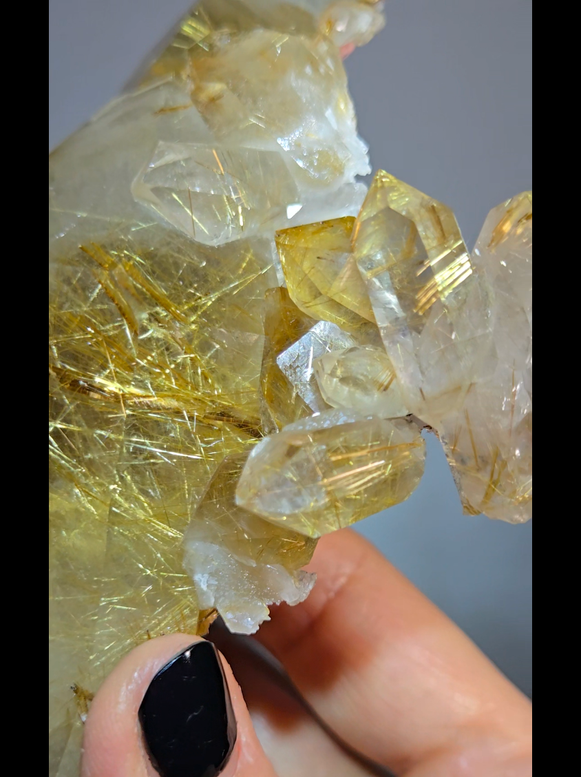 Golden titanium rutiles on black hematite in quartz cluster - RT1443