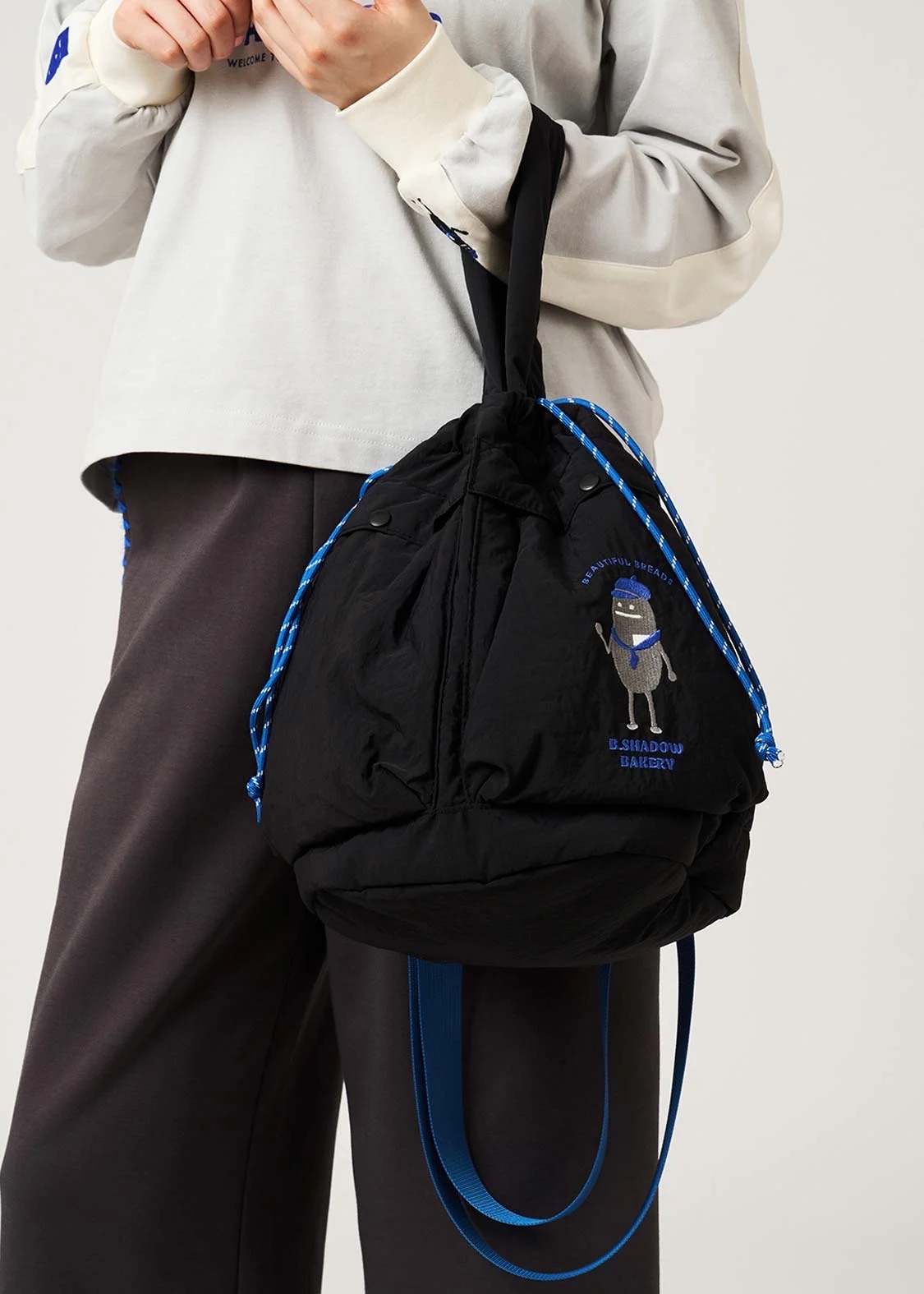 日本預訂📍黑豆人得意麵包圖案斜咩袋/兩用袋