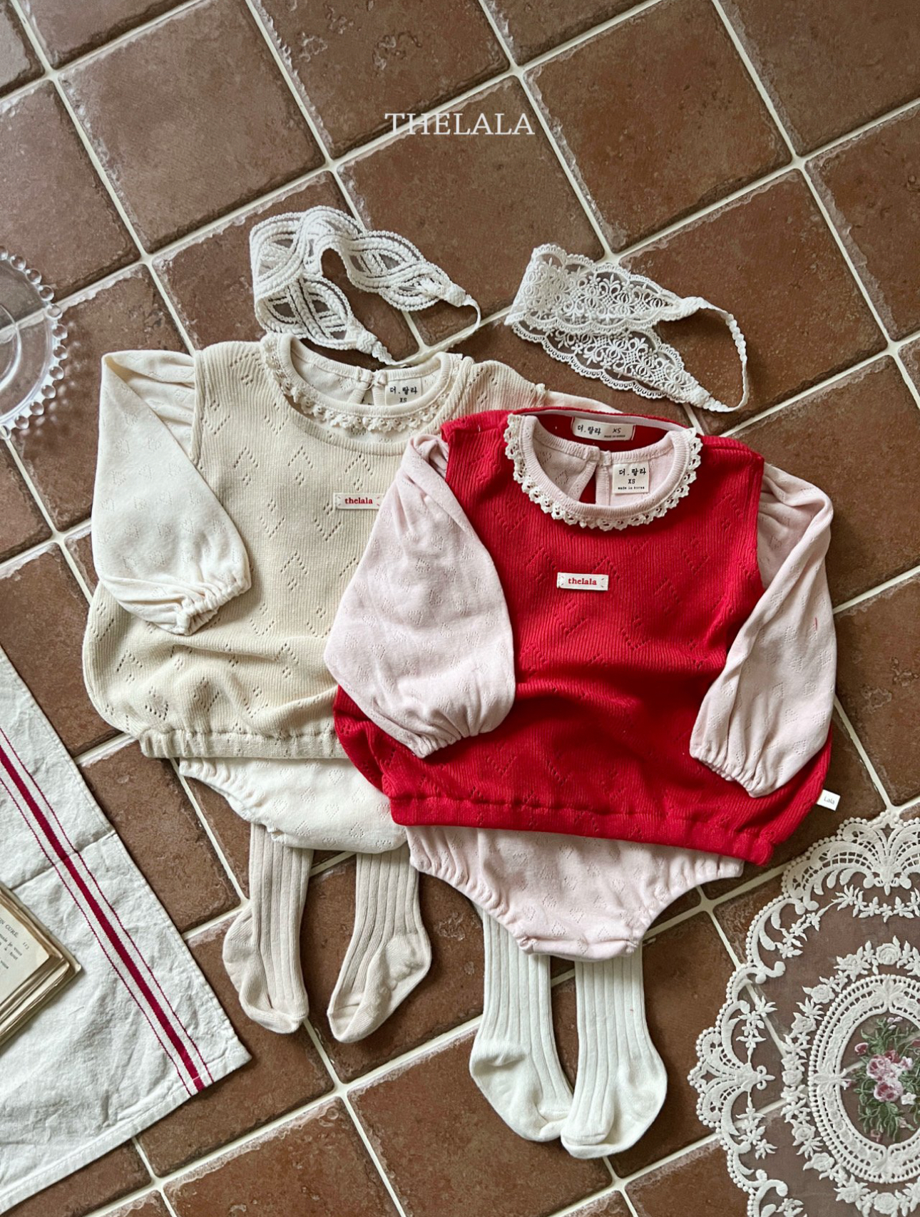 🌸預訂 韓國直送🌸🇰🇷THELALA兩色蕾絲心心通花長袖包屁衣