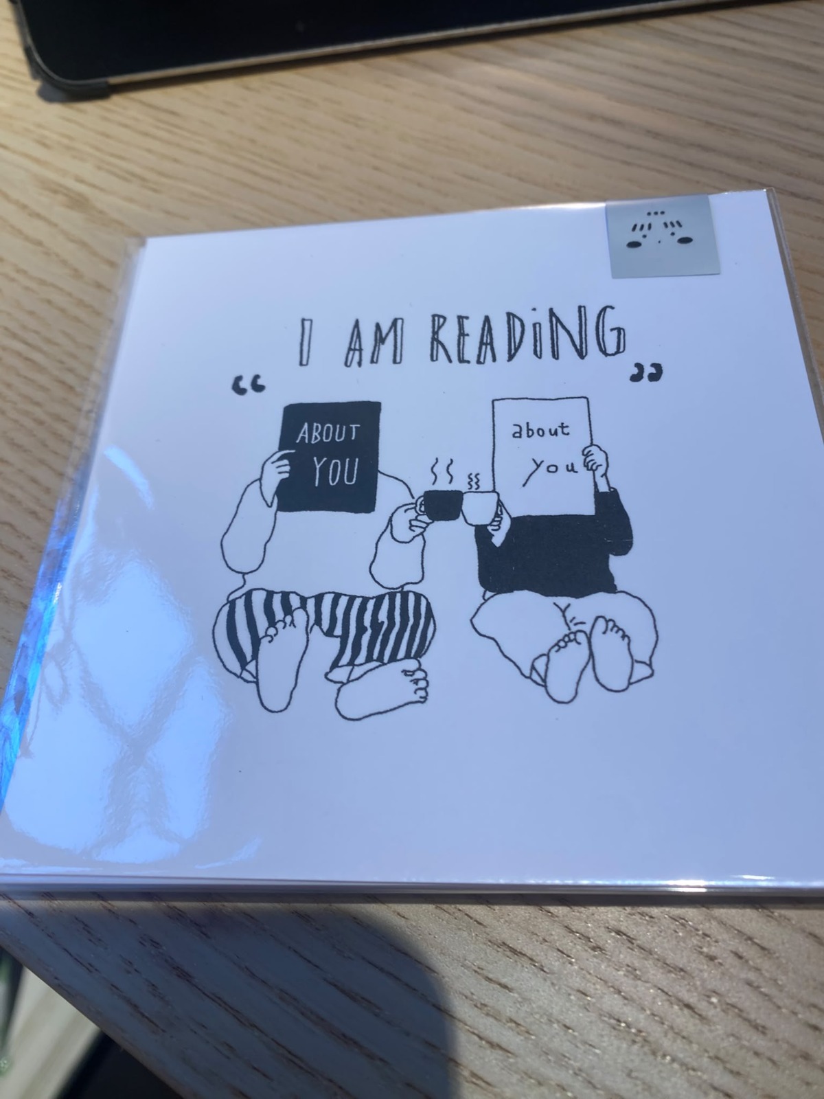 heidi in planC postcard - i am reading