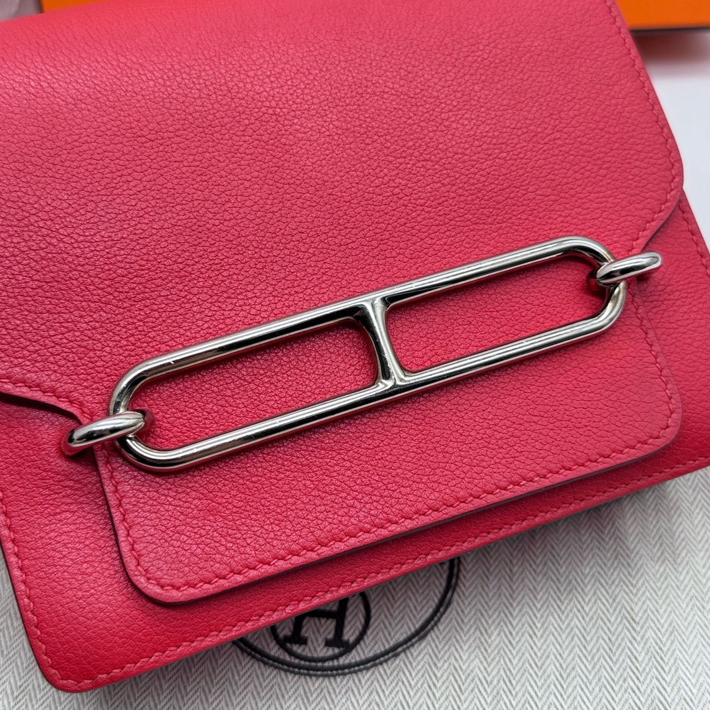Pre owned hermes roulis mini stamp X/ Y08211