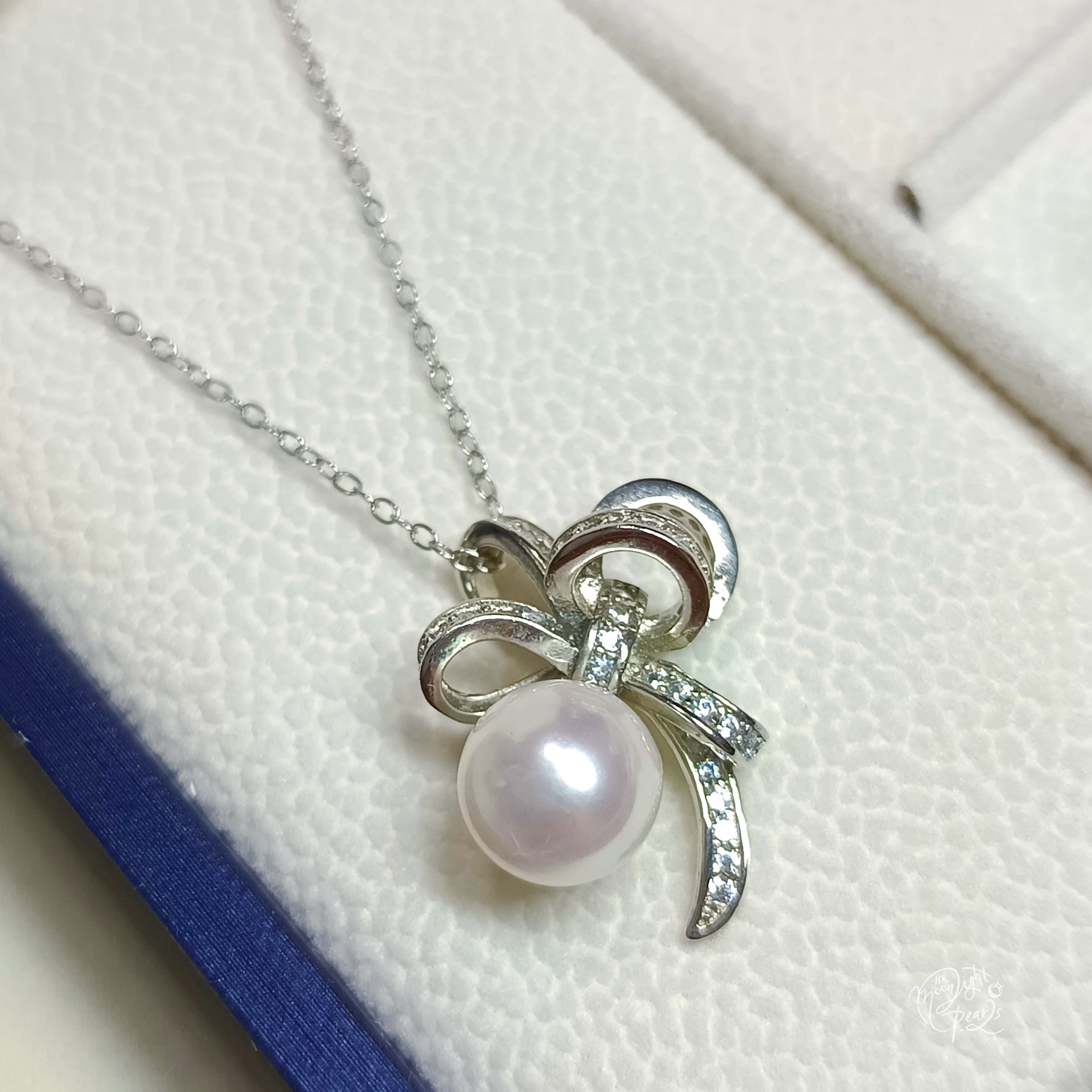 正圓極光日本akoya櫻花粉海水珍珠MIKIMOTO緞帶蝴蝶結款精工s925銀微鑲鋯石耳釘吊墜戒指套裝