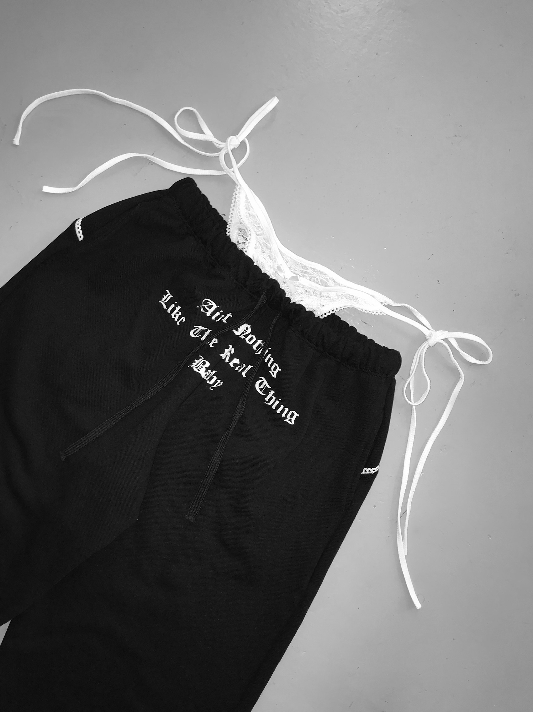 Layered Lace Waist Graphic Wide Leg Pants