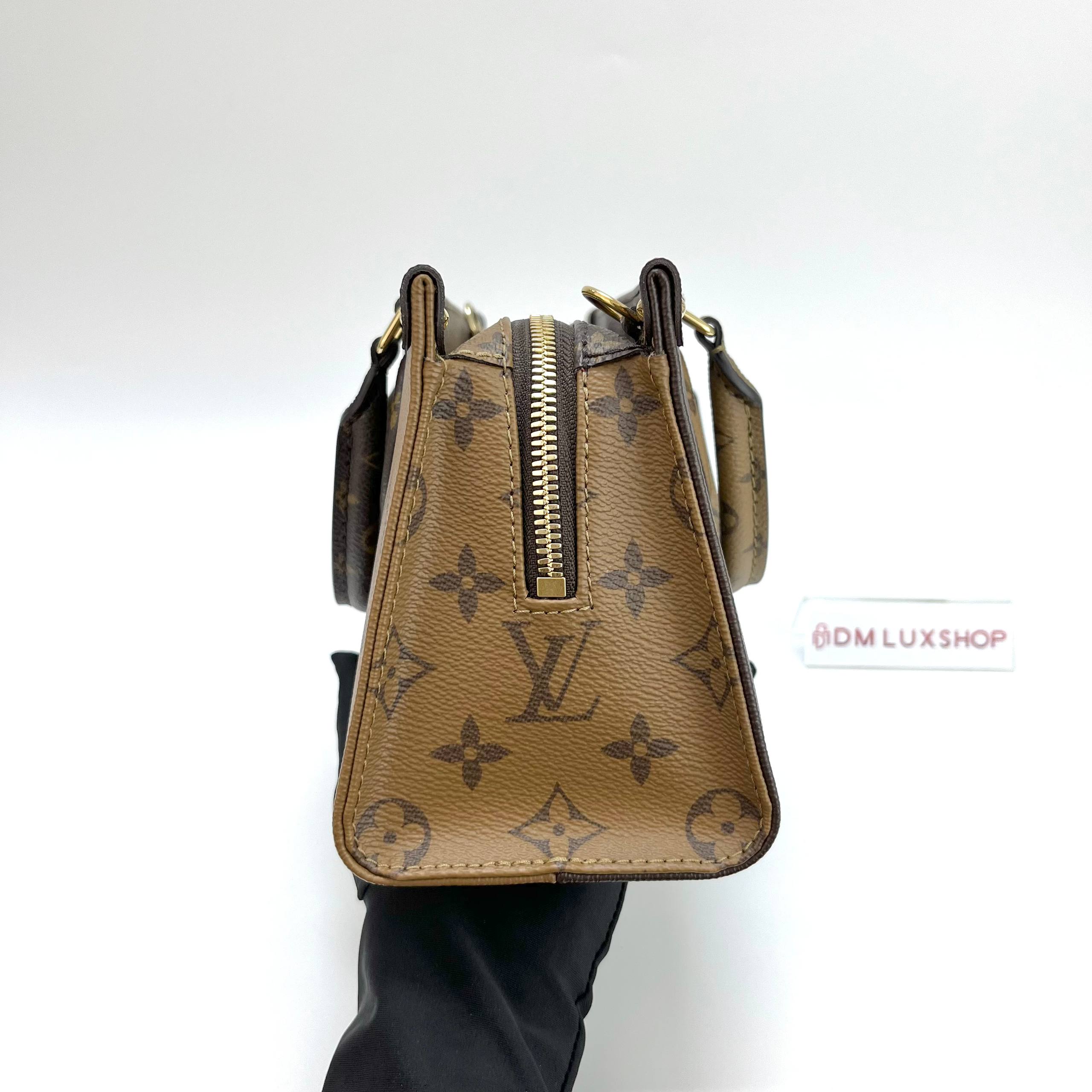 LV Reverse Monogram OnTheGo East West GHW