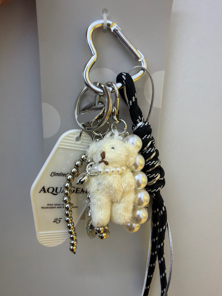 Multi-charm keychain with baseball, bat, star, whale tail, and numbered/lettered beads