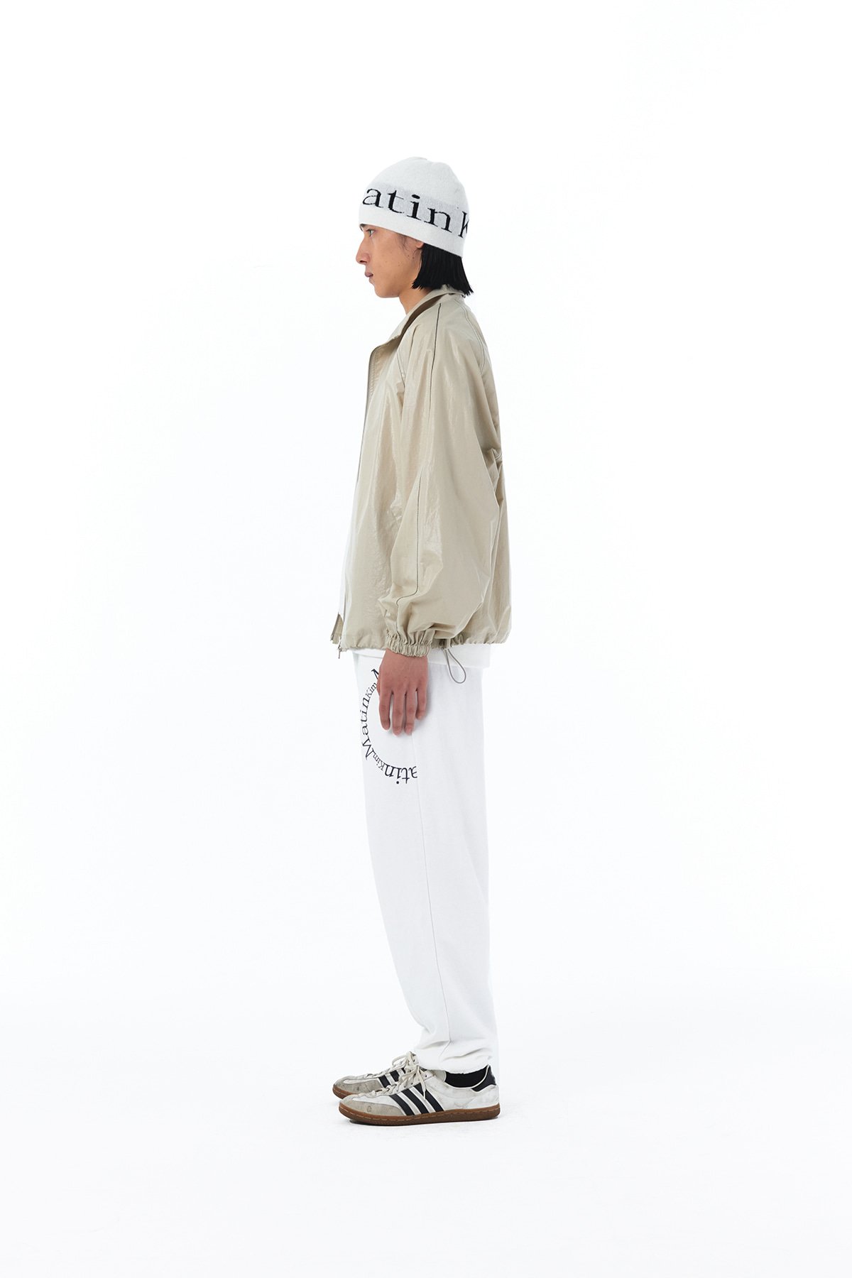 MATIN KIM LOGO COATING JUMPER IN BEIGE | KAZUE