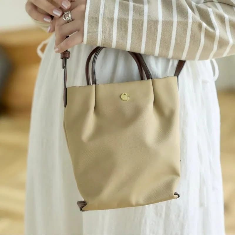 $125隻。2隻起$ 110隻Legato Largo 縱型輕巧尼龍斜孭袋